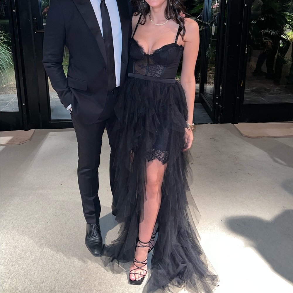 Black gown size small. Worn once